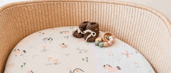An image showing a bassinet fitted sheet