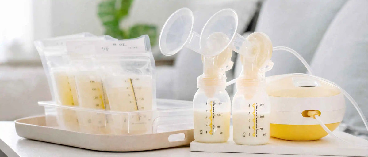 Breast pump and plastic bags to store pumped milk