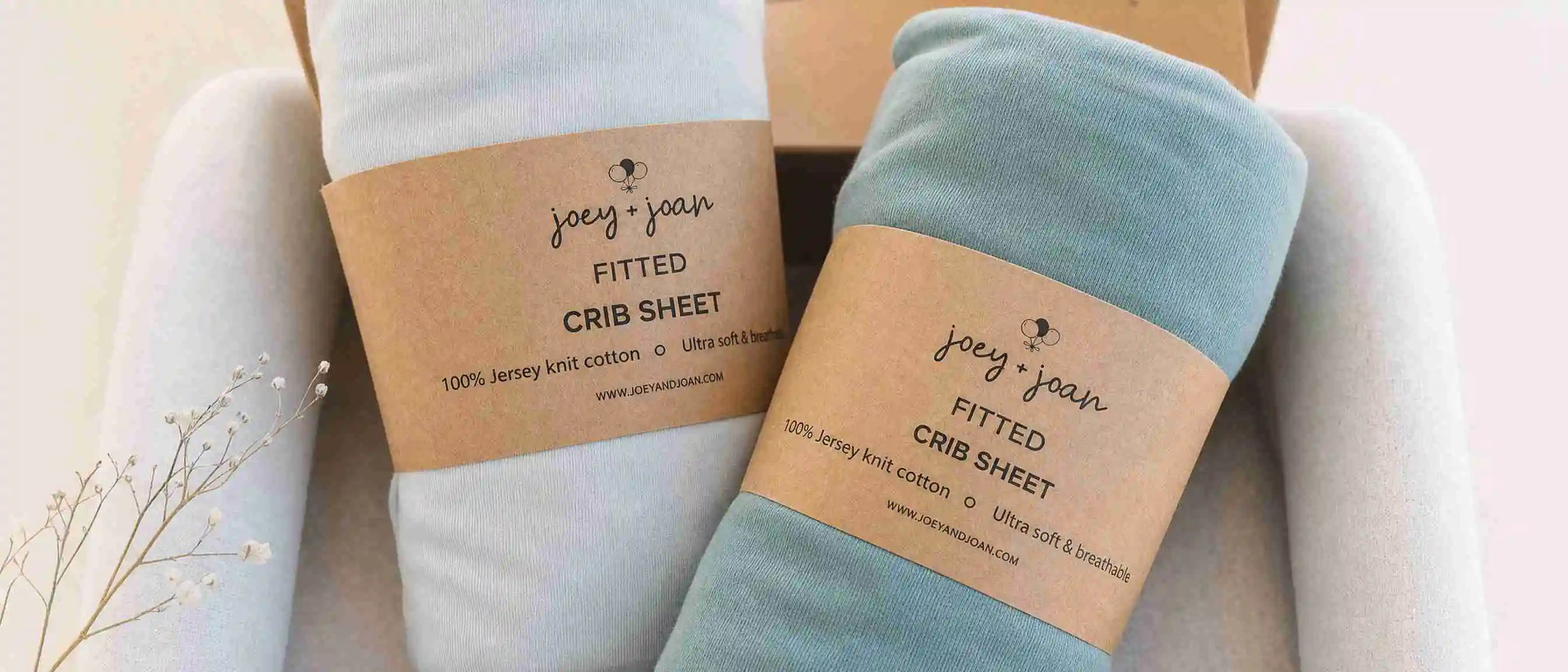 An image showing nestig mini crib sheets