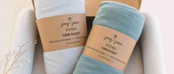 An image showing nestig mini crib sheets