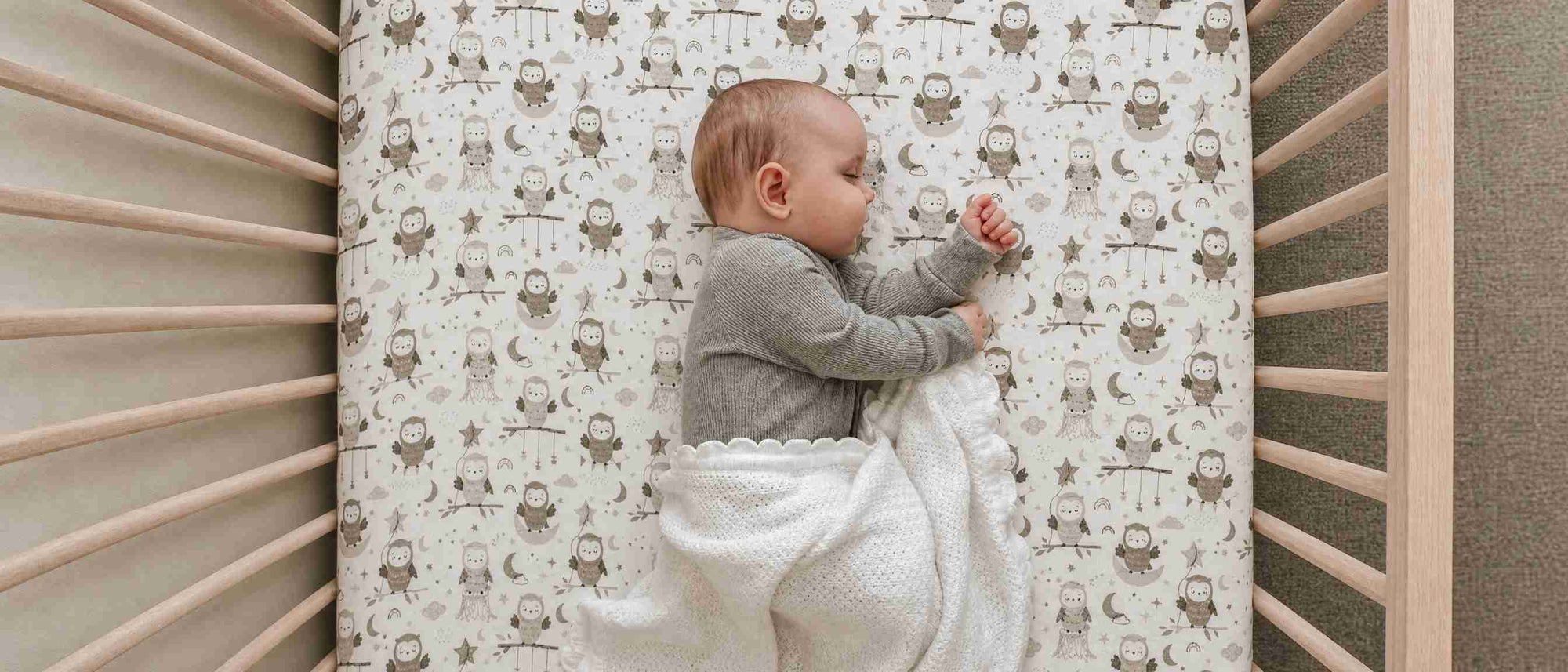 A baby sleeping in the crib