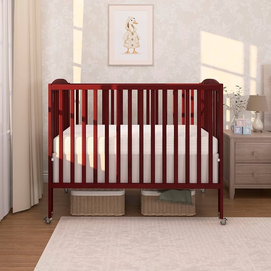 A Dream On Me portable crib in a nursery