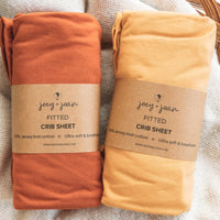 Cotton Jersey Fitted Sheets for Standard Cribs and Toddler Beds (28 x 52 inch)  – Mustard Yellow + Burnt Orange (2 Pack)