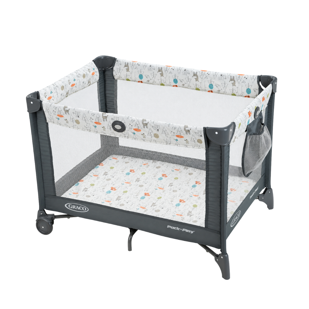 A Joey + Joan fitted sheet in a crib beside a chest of drawers